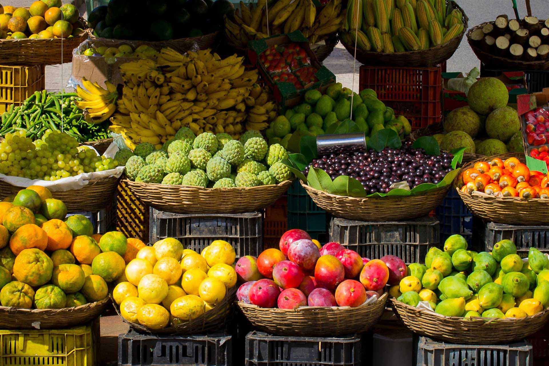 fresh fruit in baskets at a market