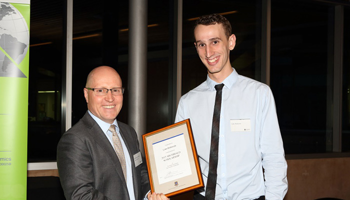 Luke McKenzie with Economics Head of School Professor Rodney Strachan