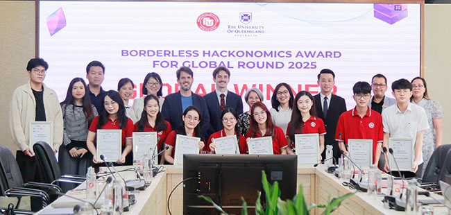 Student winners of the 2025 Borderless Hackonomics competiton , holding their awards and standing with staff.