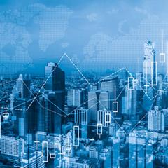white graph superimposed over a blue tinted city