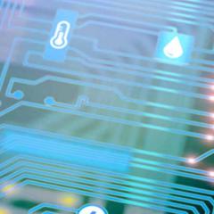 Circuit board with home icons on it