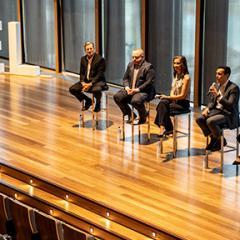 Panelist talking on stage at previous careers day 