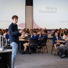 Kieran Gibson presenting to an audience of students