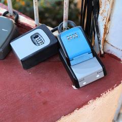 Key boxes around a fence
