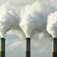 Multiple Coal Fossil Fuel Power Plant Smokestacks Emit Carbon Dioxide Pollution